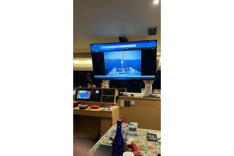 Chicago Yacht Photos Pics Interior of a 2020 Lagoon 52 F yacht with navigation equipment and screen display.