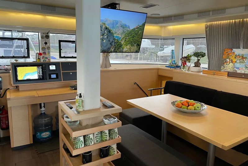 Chicago Yacht Photos Pics Luxurious interior of 2020 Lagoon 52 F yacht with modern decor and navigation equipment.