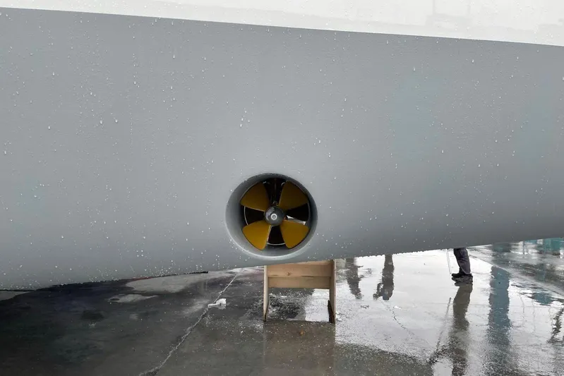 Chicago Yacht Photos Pics Close-up of a 2020 Lagoon 52 F yacht's hull with visible propeller.