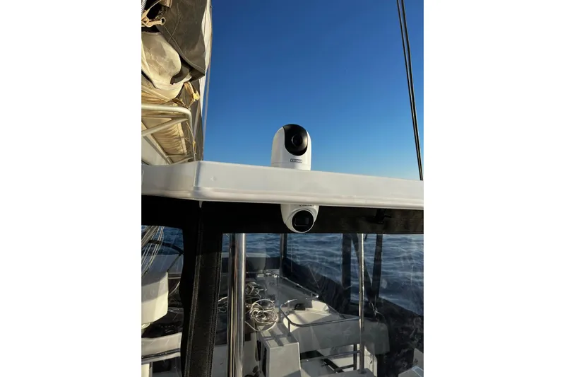 Chicago Yacht Photos Pics 2020 Lagoon 52 F yacht with camera, clear sky, and ocean view.