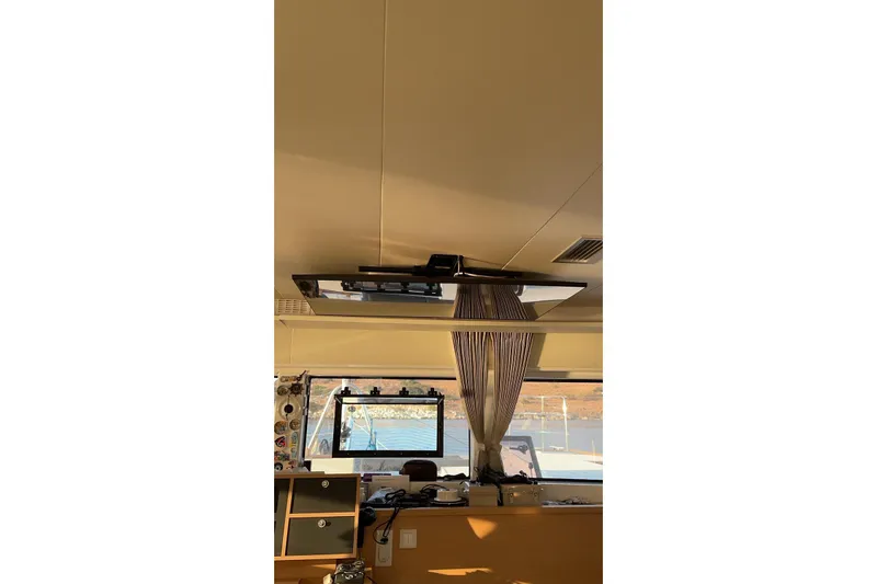 Chicago Yacht Photos Pics Interior view of 2020 Lagoon 52 F yacht with window and curtain.