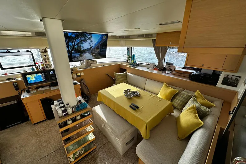 Chicago Yacht Photos Pics Luxurious interior of 2020 Lagoon 52 F yacht with modern decor and scenic window views.