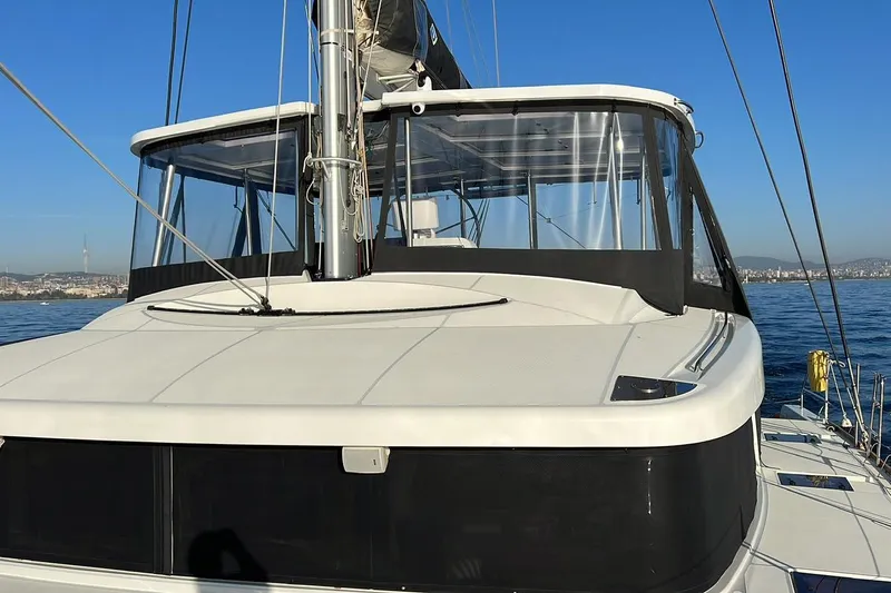 Chicago Yacht Photos Pics 2020 Lagoon 52 F catamaran on calm sea with clear blue sky.