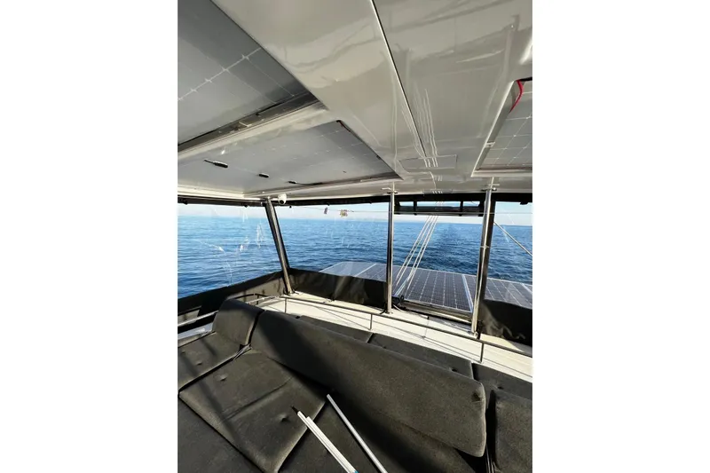 Chicago Yacht Photos Pics Interior view of 2020 Lagoon 52 F catamaran with ocean backdrop.