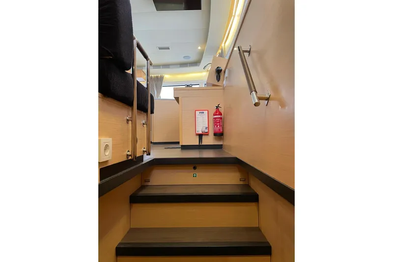 Chicago Yacht Photos Pics Interior stairs of 2020 Lagoon 52 F yacht with modern design and safety features.