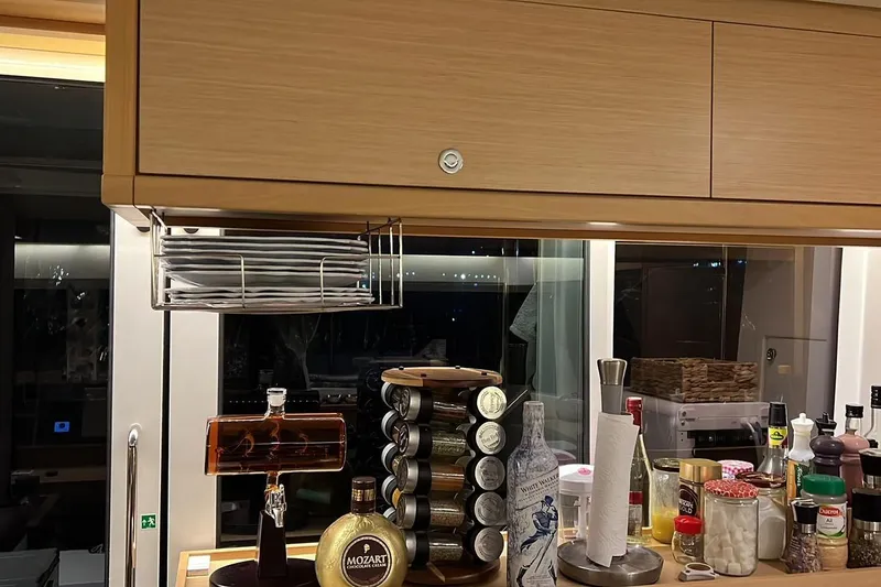 Chicago Yacht Photos Pics Kitchen area on a 2020 Lagoon 52 F yacht with spices and beverages.