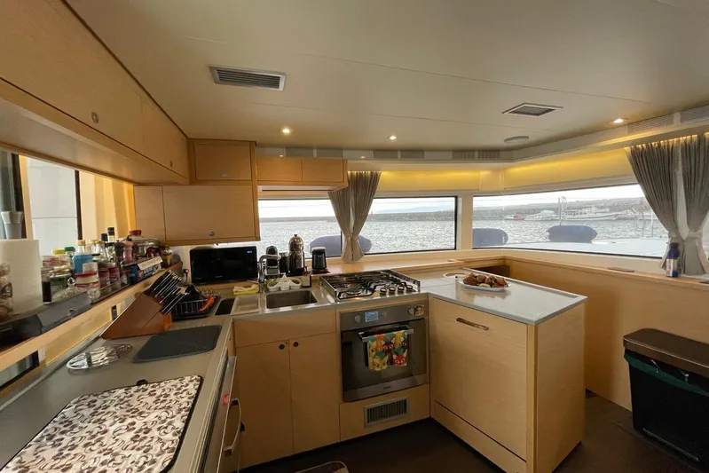 Chicago Yacht Photos Pics Modern kitchen interior on 2020 Lagoon 52 F yacht with ocean view.