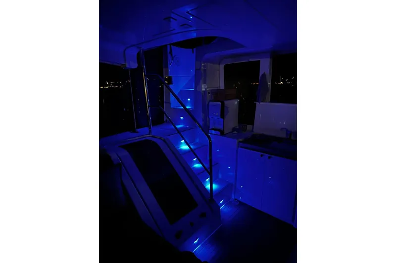 Chicago Yacht Photos Pics 2020 Lagoon 52 F yacht interior with blue LED lighting at night.