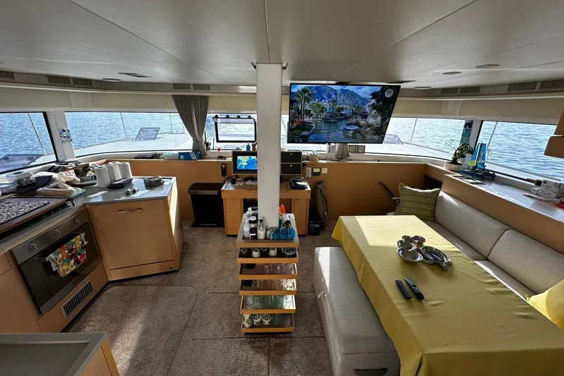 Chicago Yacht Photos Pics Interior of 2020 Lagoon 52 F catamaran with modern kitchen and cozy seating area.