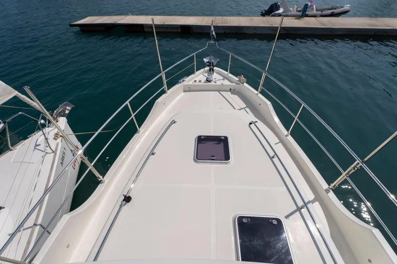  Yacht Photos Pics Bow view of 2024 Nordhavn 41 yacht docked at marina.