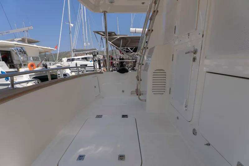  Yacht Photos Pics 2024 Nordhavn 41 yacht deck with sleek design and marina view.