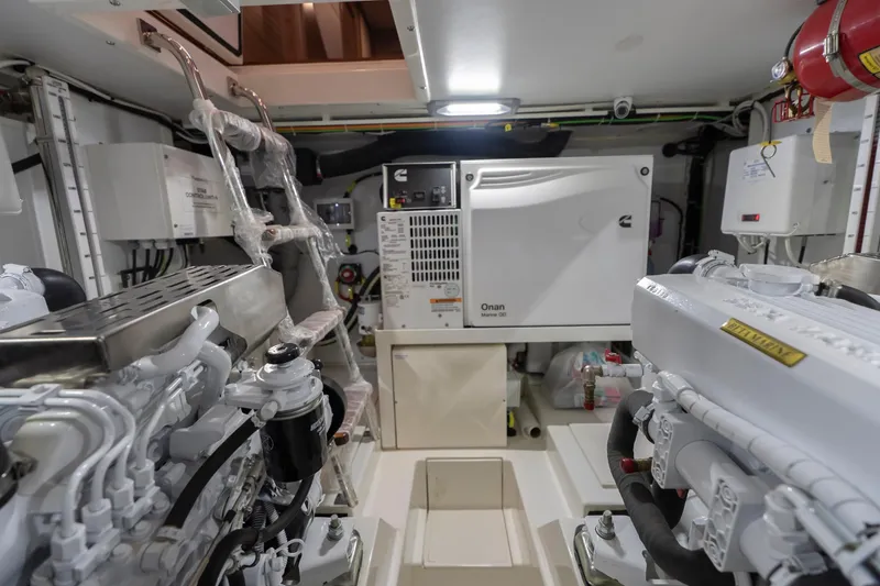  Yacht Photos Pics Engine room of 2024 Nordhavn 41 yacht featuring Onan generator and advanced machinery.