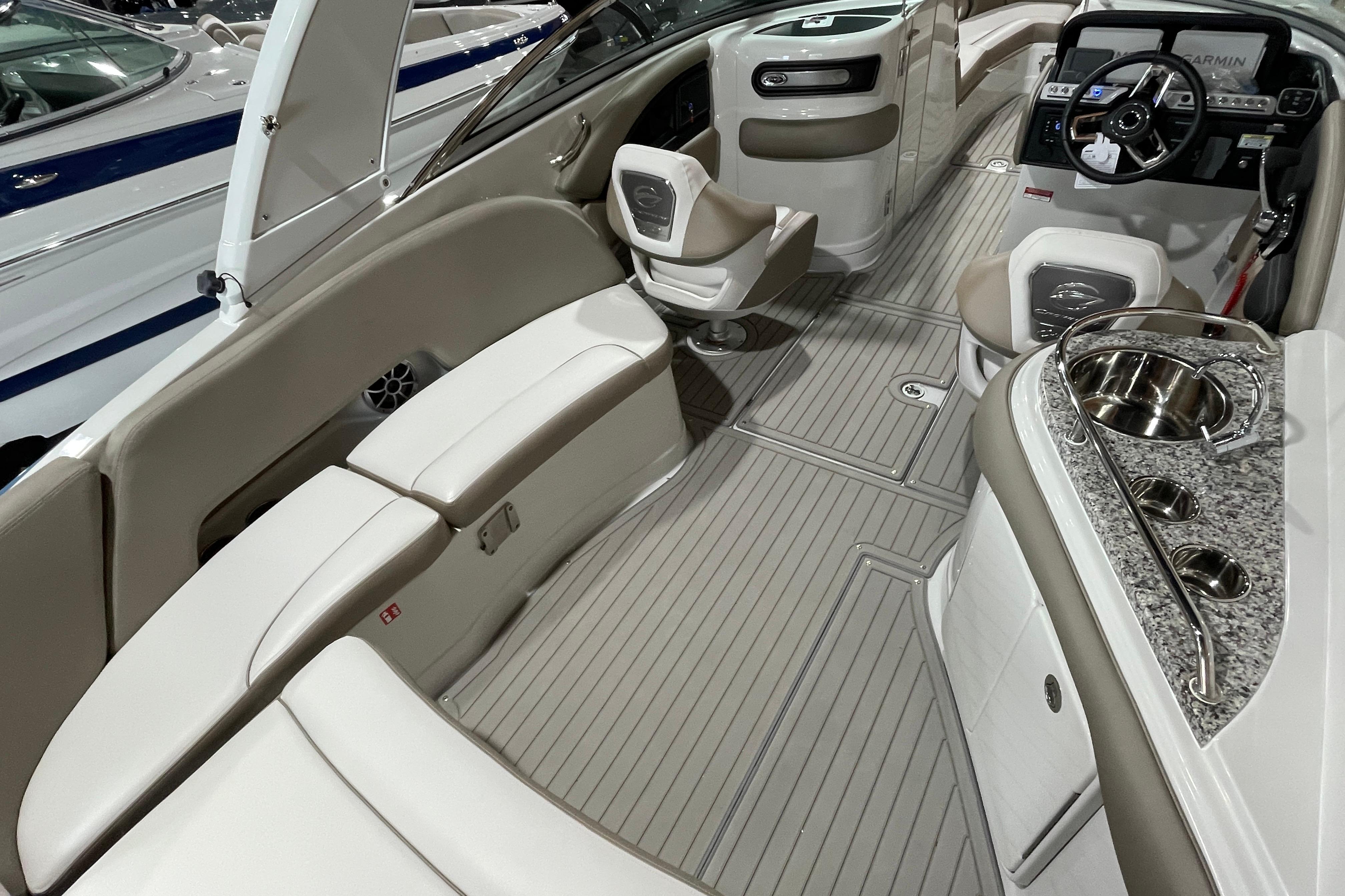 Luxurious interior of 2026 Crownline 298 SS boat with elegant seating and modern amenities.