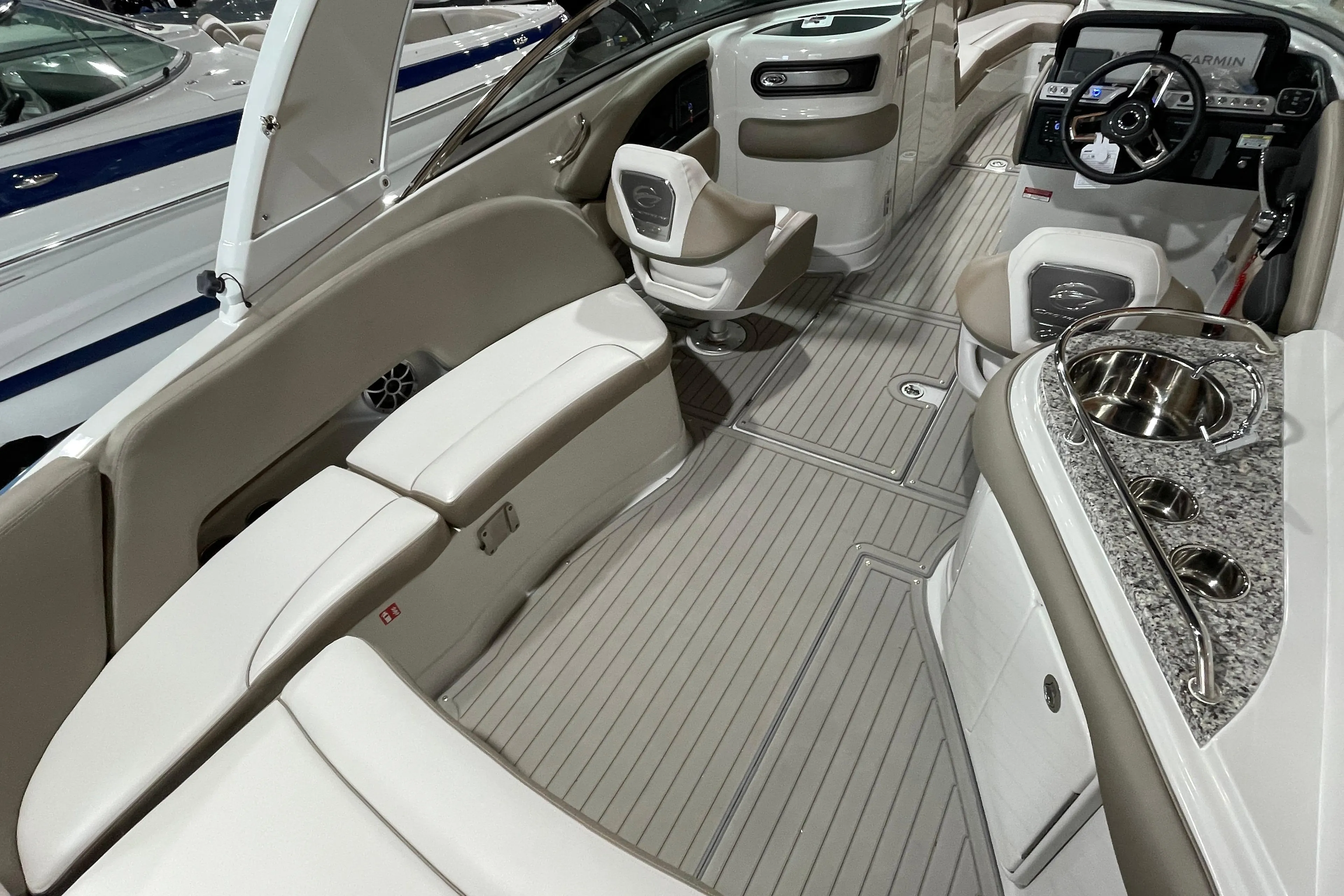 Luxurious interior of 2026 Crownline 298 SS boat with elegant seating and modern amenities.