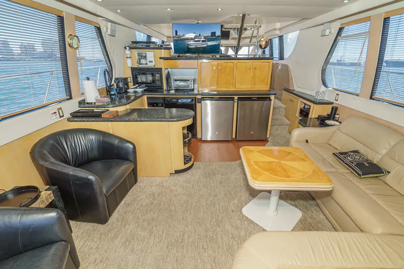 All Falked Up Yacht Photos Pics Luxurious interior of 1999 Carver 530 Voyager Pilothouse yacht with modern amenities.