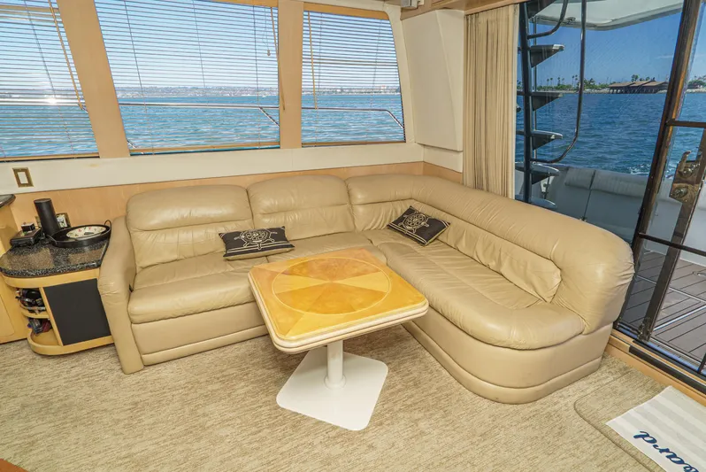 All Falked Up Yacht Photos Pics Luxurious interior of 1999 Carver 530 Voyager Pilothouse with leather seating and ocean view.