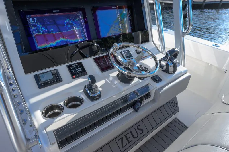  Yacht Photos Pics 2022 SeaVee 390Z boat dashboard with advanced navigation and control systems.