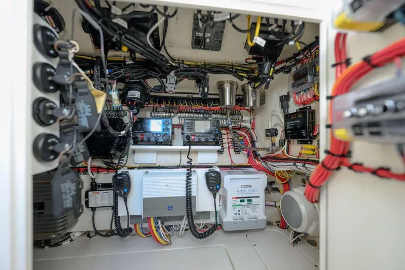  Yacht Photos Pics Interior view of 2022 SeaVee 390Z boat's electrical system with wiring and control panels.