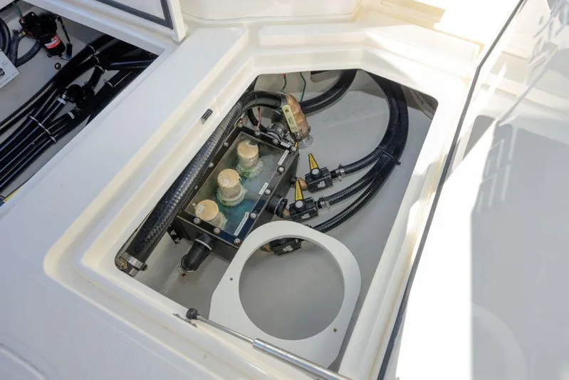  Yacht Photos Pics 2022 SeaVee 390Z boat compartment with visible wiring and components.