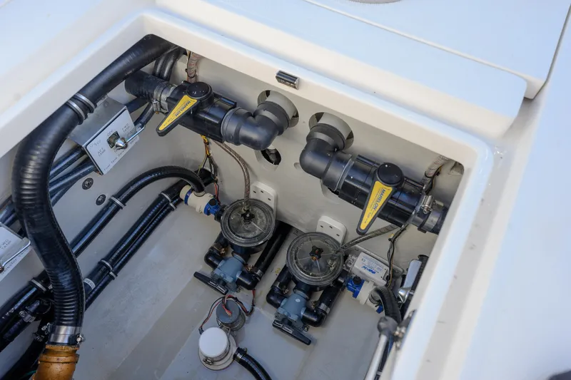  Yacht Photos Pics 2022 SeaVee 390Z boat plumbing system with valves and hoses.