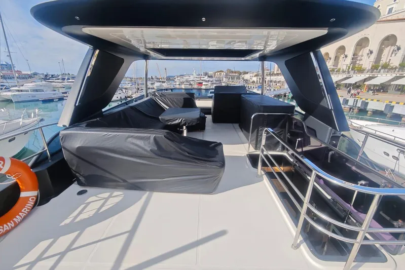 Arktur Yacht Photos Pics Luxurious 2023 Cranchi Sessantasette 67 yacht deck with marina view.