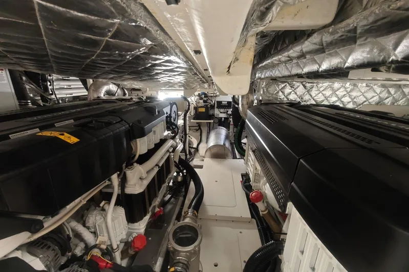 Arktur Yacht Photos Pics Engine room of 2023 Cranchi Sessantasette 67 yacht, showcasing advanced machinery and insulation.