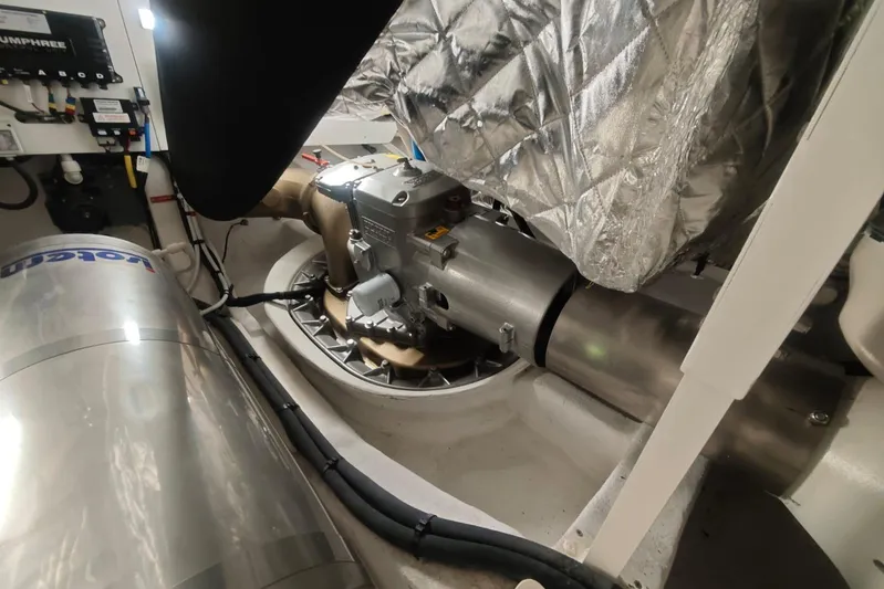 Arktur Yacht Photos Pics Engine room of 2023 Cranchi Sessantasette 67 yacht, showcasing mechanical components and insulation.