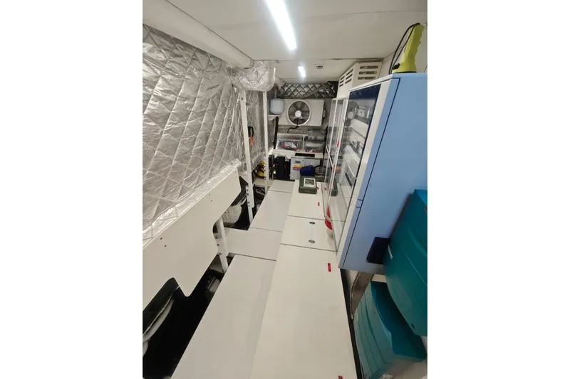 Arktur Yacht Photos Pics Interior of 2023 Cranchi Sessantasette 67 yacht, featuring storage and equipment.