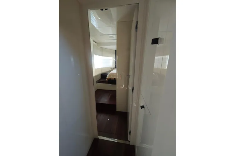 Arktur Yacht Photos Pics Interior view of 2023 Cranchi Sessantasette 67 yacht cabin with modern design.