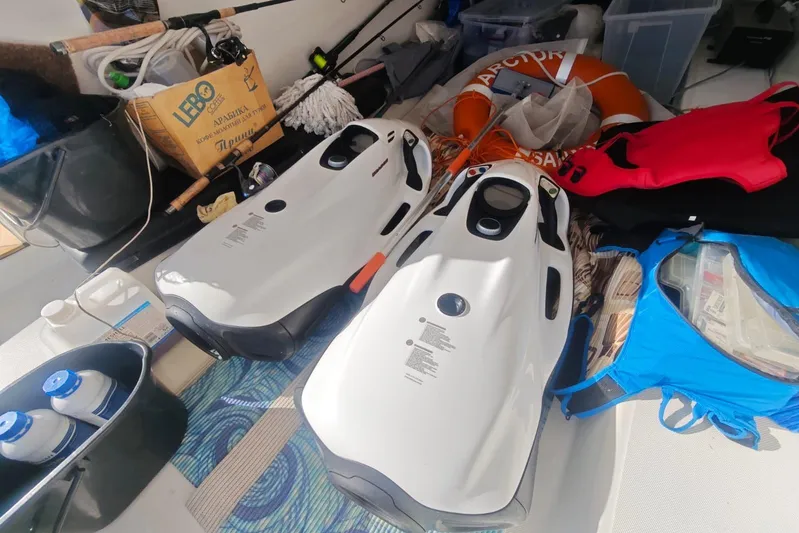 Arktur Yacht Photos Pics Storage area on a 2023 Cranchi Sessantasette 67 yacht with water sports equipment and supplies.