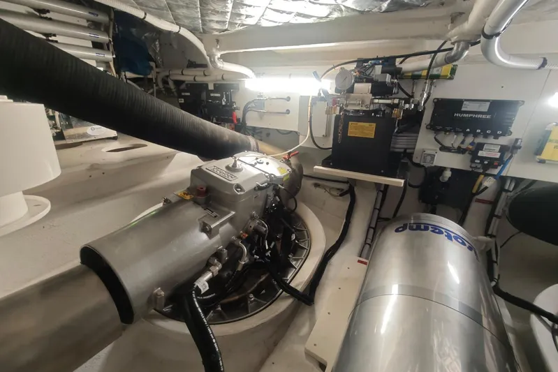 Arktur Yacht Photos Pics Engine room of 2023 Cranchi Sessantasette 67 yacht, showcasing mechanical components and systems.