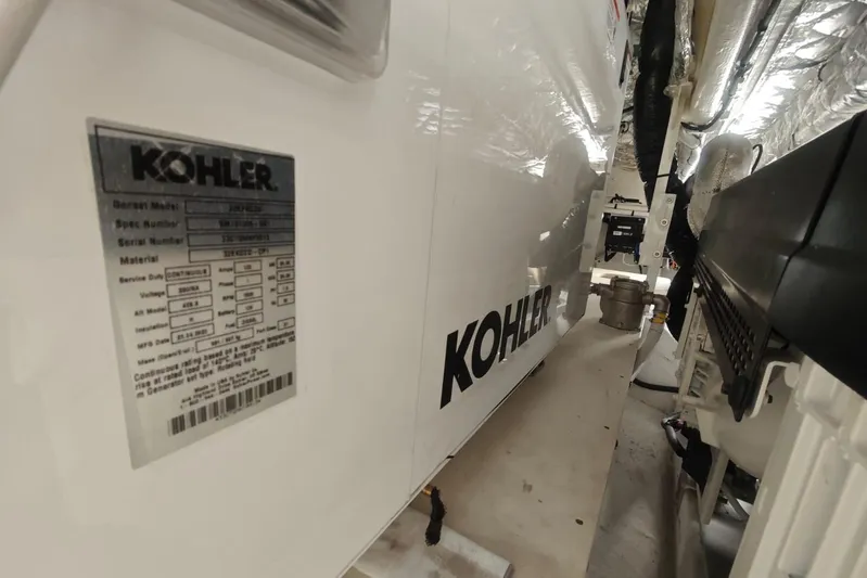 Arktur Yacht Photos Pics Engine room of 2023 Cranchi Sessantasette 67 featuring Kohler generator.