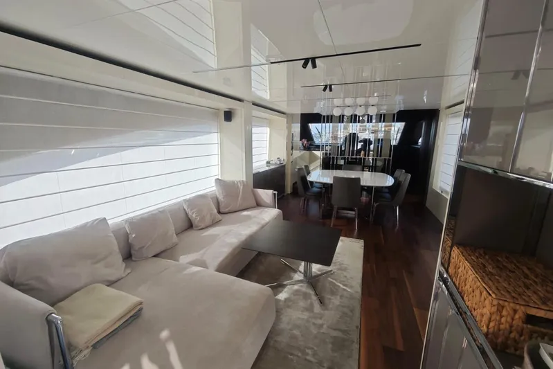 Arktur Yacht Photos Pics Luxurious interior of 2023 Cranchi Sessantasette 67 yacht with modern furnishings and elegant design.