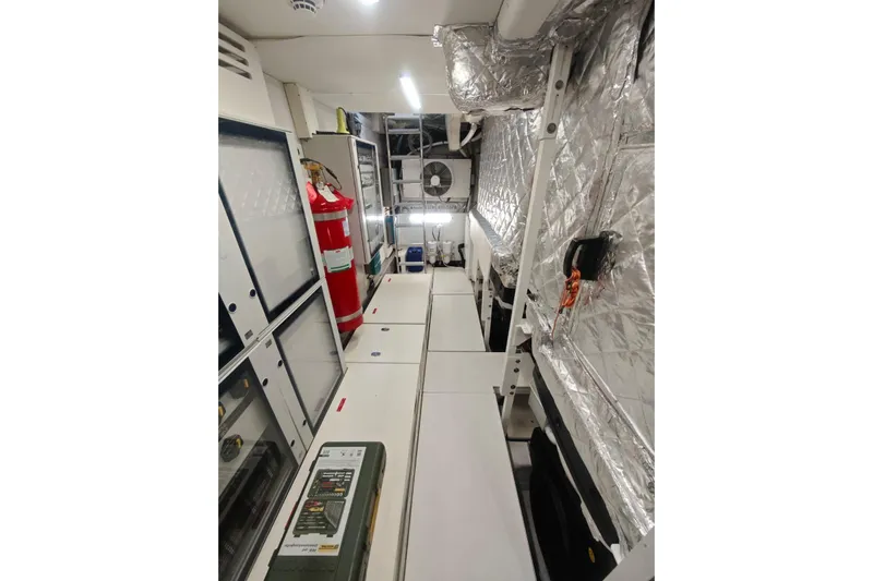 Arktur Yacht Photos Pics Engine room of 2023 Cranchi Sessantasette 67 yacht with modern equipment and insulation.