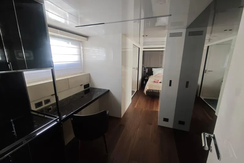 Arktur Yacht Photos Pics Luxurious interior of 2023 Cranchi Sessantasette 67 yacht with modern furnishings and elegant design.