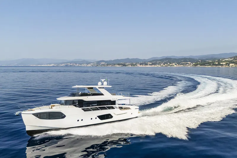  Yacht Photos Pics Luxury yacht Absolute NAVETTA 70 cruising on open water, 2026 model.