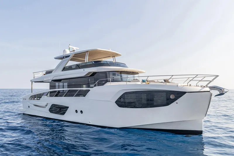  Yacht Photos Pics Luxurious 2026 Absolute NAVETTA 70 yacht cruising on open sea.