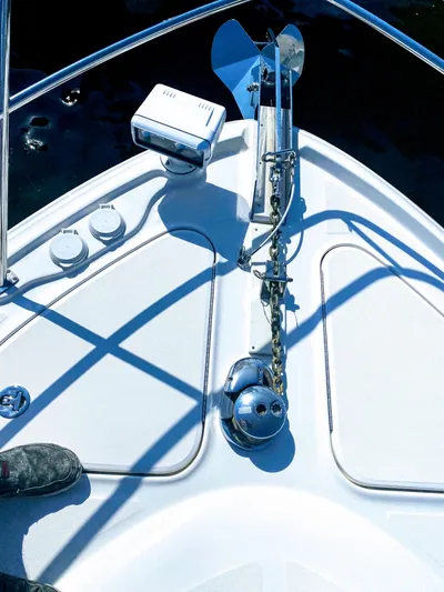 Down Time Yacht Photos Pics Bow of 2010 Sea Ray 500 Sundancer with anchor and chain mechanism.