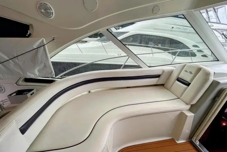 Down Time Yacht Photos Pics Luxurious interior of 2010 Sea Ray 500 Sundancer yacht with plush seating.