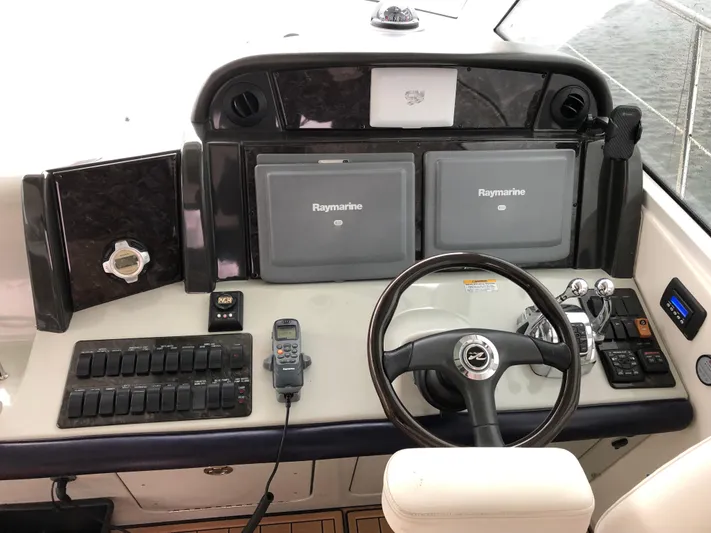 Down Time Yacht Photos Pics Cockpit of 2010 Sea Ray 500 Sundancer with Raymarine navigation system.