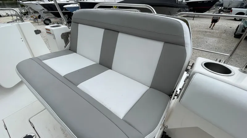  Yacht Photos Pics 2018 Cutwater C-30 Command Bridge LE boat seat with gray and white upholstery.