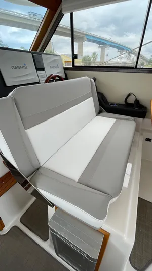  Yacht Photos Pics 2018 Cutwater C-30 Command Bridge LE interior with gray and white seating.