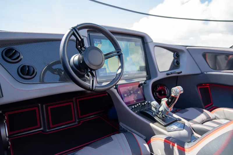  Yacht Photos Pics 2024 MTI 390X cockpit with modern steering wheel and advanced navigation display.