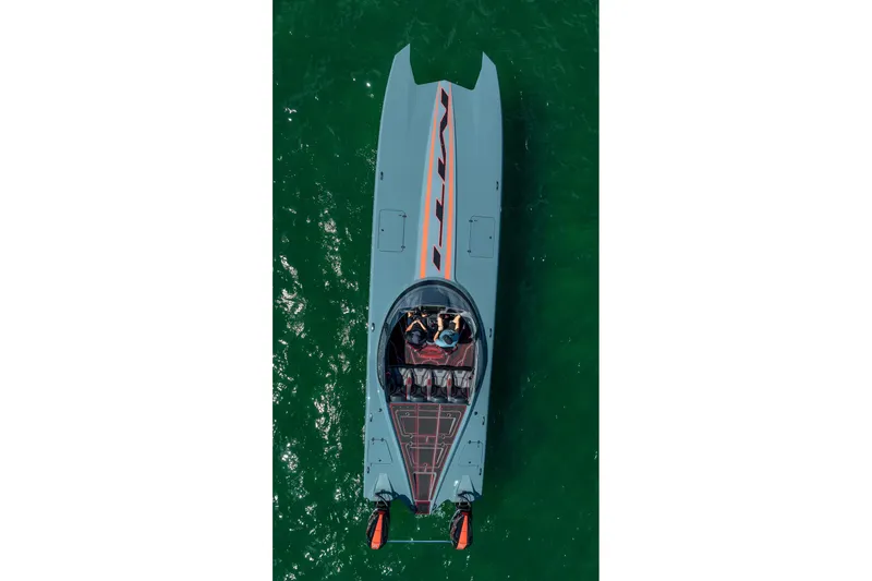  Yacht Photos Pics Overhead view of 2024 MTI 390X speedboat on green water.