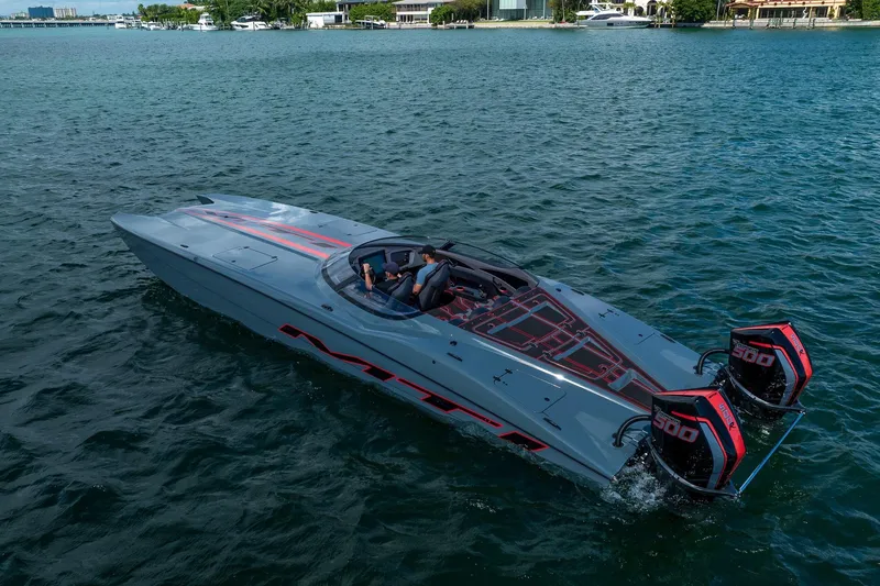  Yacht Photos Pics 2024 MTI 390X powerboat cruising on a scenic waterway with dual engines.