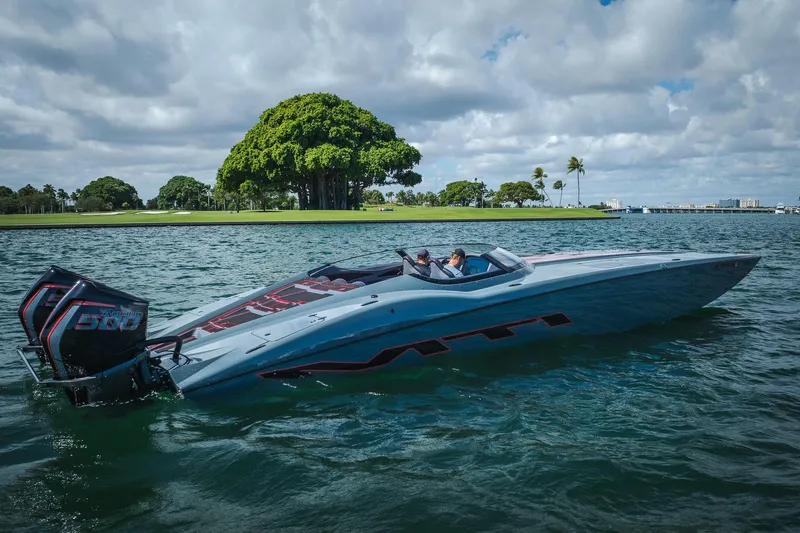  Yacht Photos Pics 2024 MTI 390X speedboat on water, featuring sleek design and powerful engines.