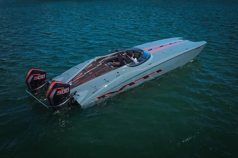  Yacht Photos Pics 2024 MTI 390X powerboat with dual Mercury 500 engines cruising on open water.