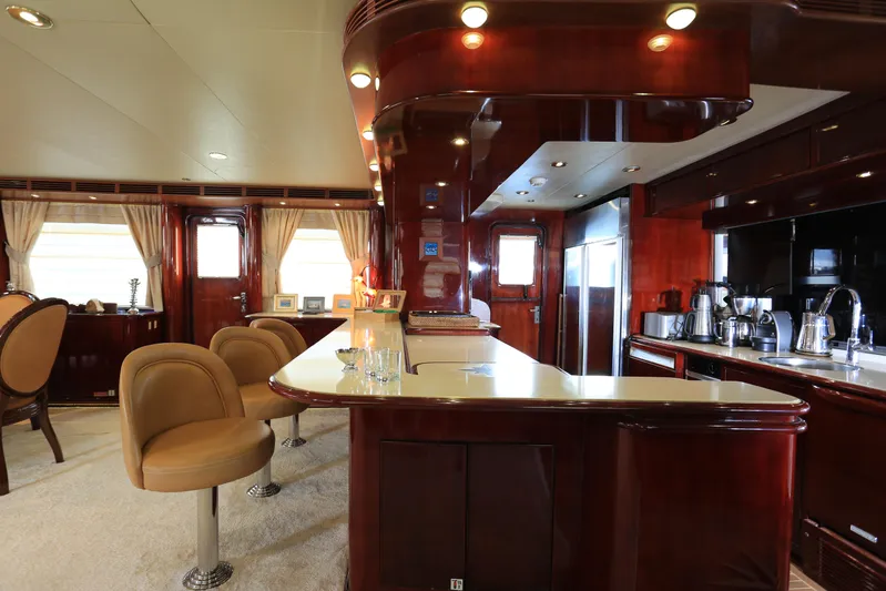 Forty Love Yacht Photos Pics Luxurious 2004 Westport Custom yacht interior with elegant bar and seating area.