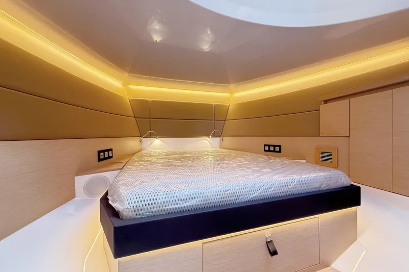 Mine Yacht Photos Pics Luxurious interior cabin of 2022 Tesoro T38 Outboard with ambient lighting and modern design.