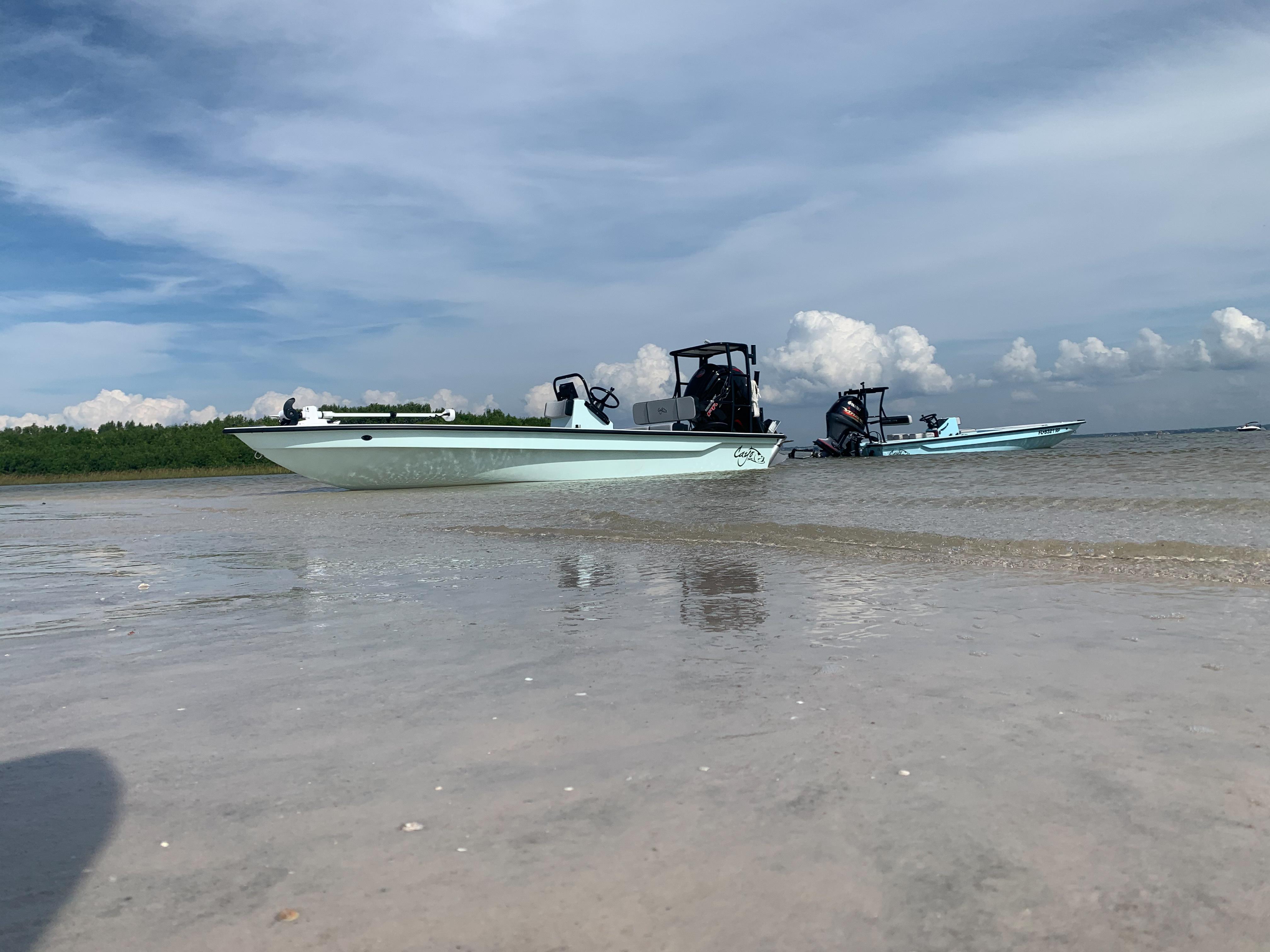 Premium Photo  Aluminum blue fishing boat with a motor near the lake shore  fishing active recreation